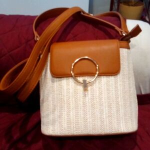 Shoulder purse, with carrying handle.  Straw like material.